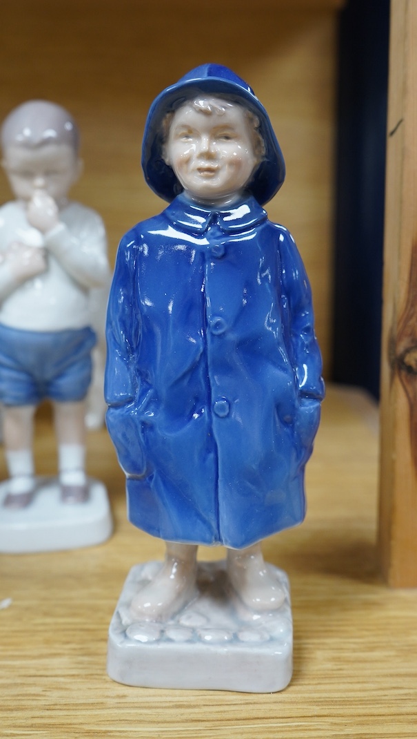 Six Royal Copenhagen or B & G figures of children and a polar bear, tallest 19.5cm. Condition - good.
